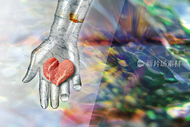 金属机器人手与人造心形牛肉。背景为Cell image。